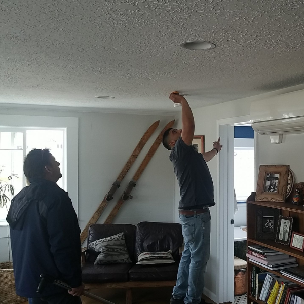 Certified expert fixing ceiling damaged by water leak